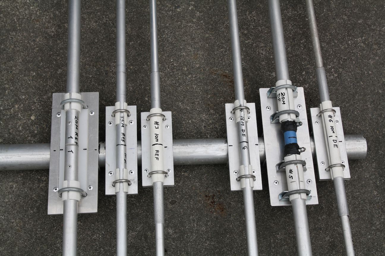Six elements sitting temporarily on the boom before being moved into place and riveted